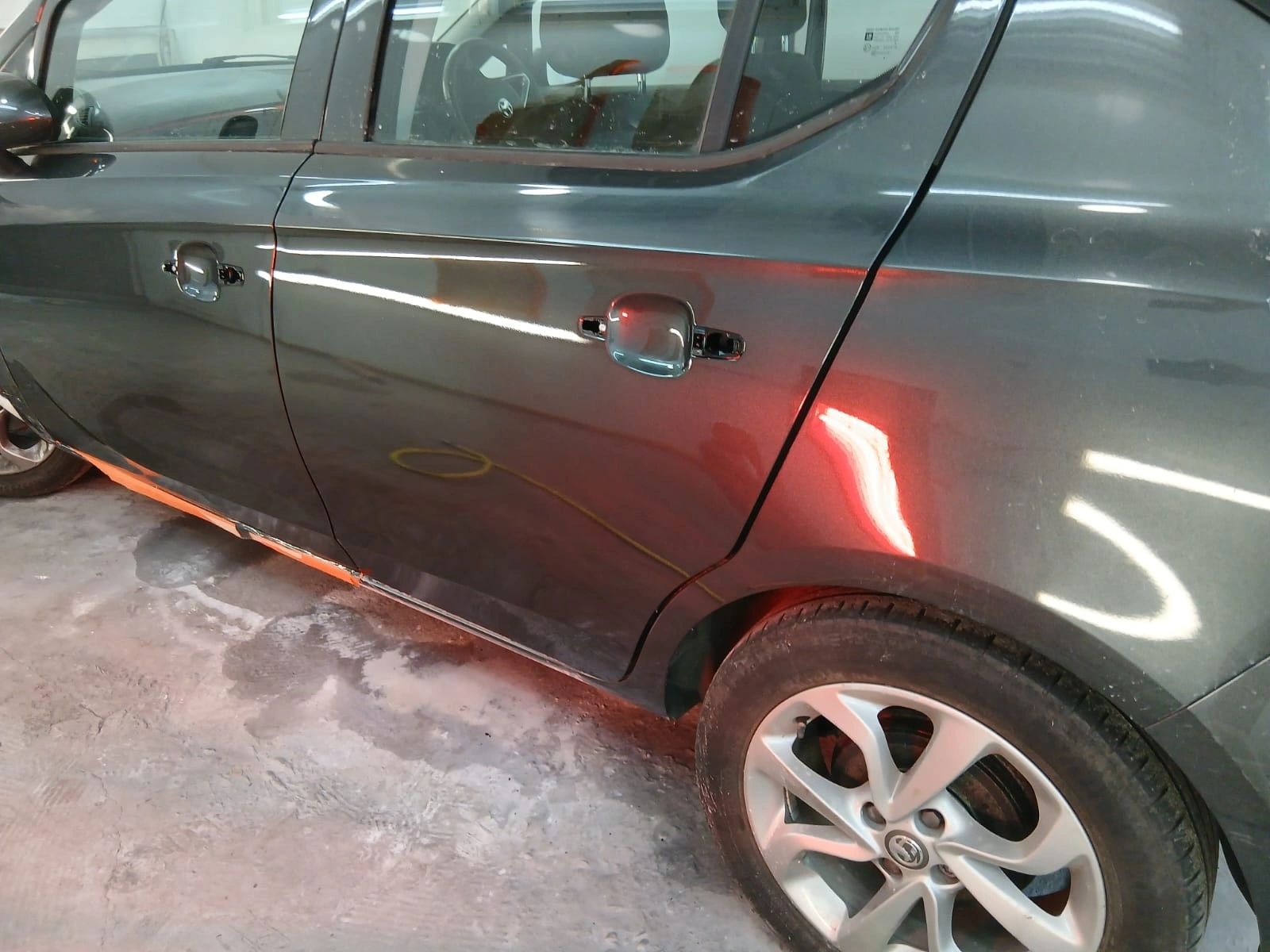 Finished grey hatchback, side view