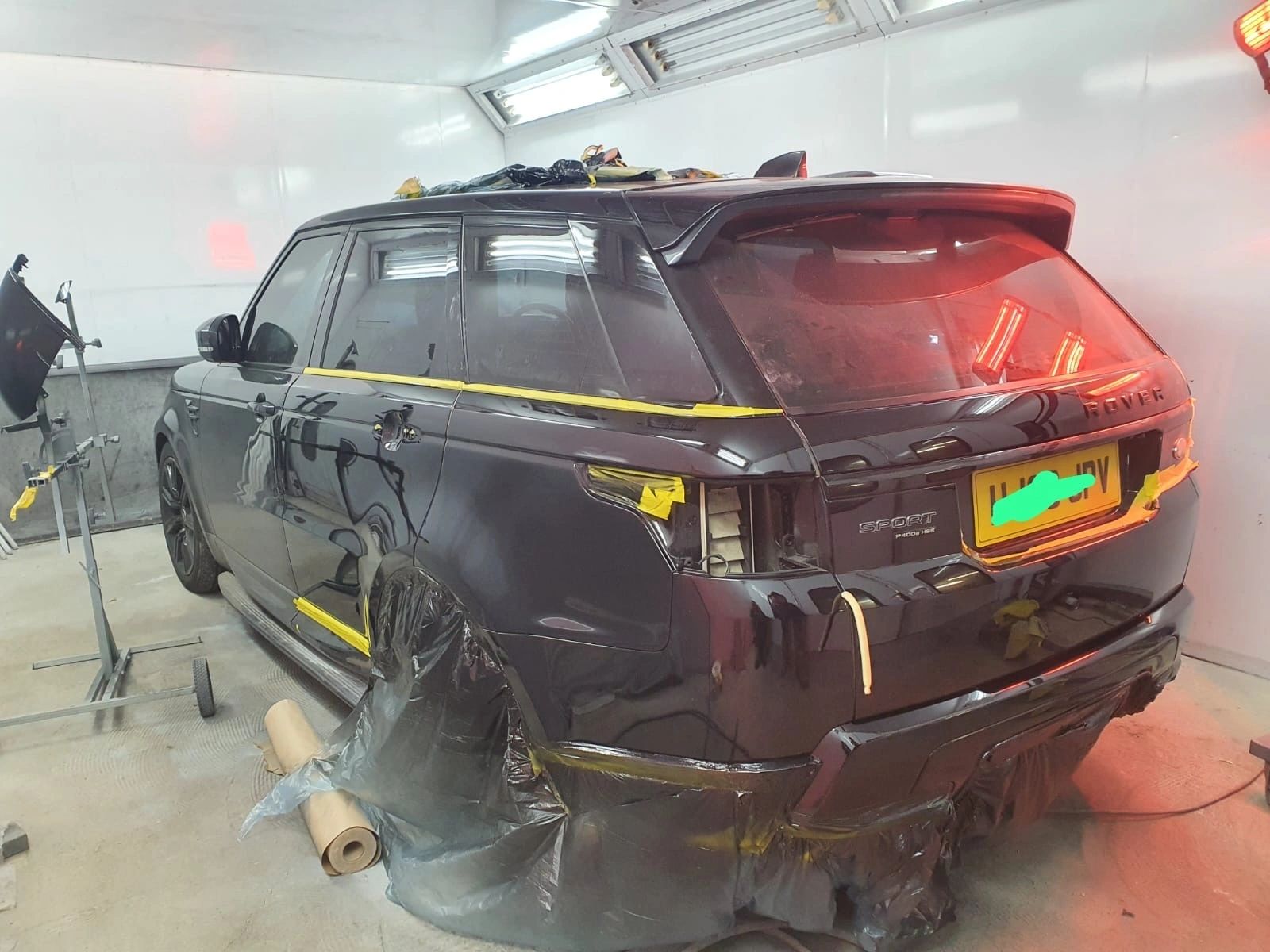 Range Rover masked up at the rear, ready to spray